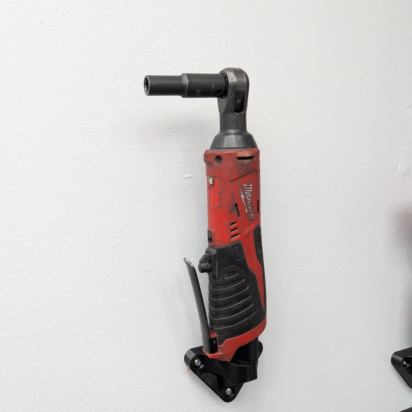 Milwaukee M12 tool mount left facing wall installation for organized tool storage