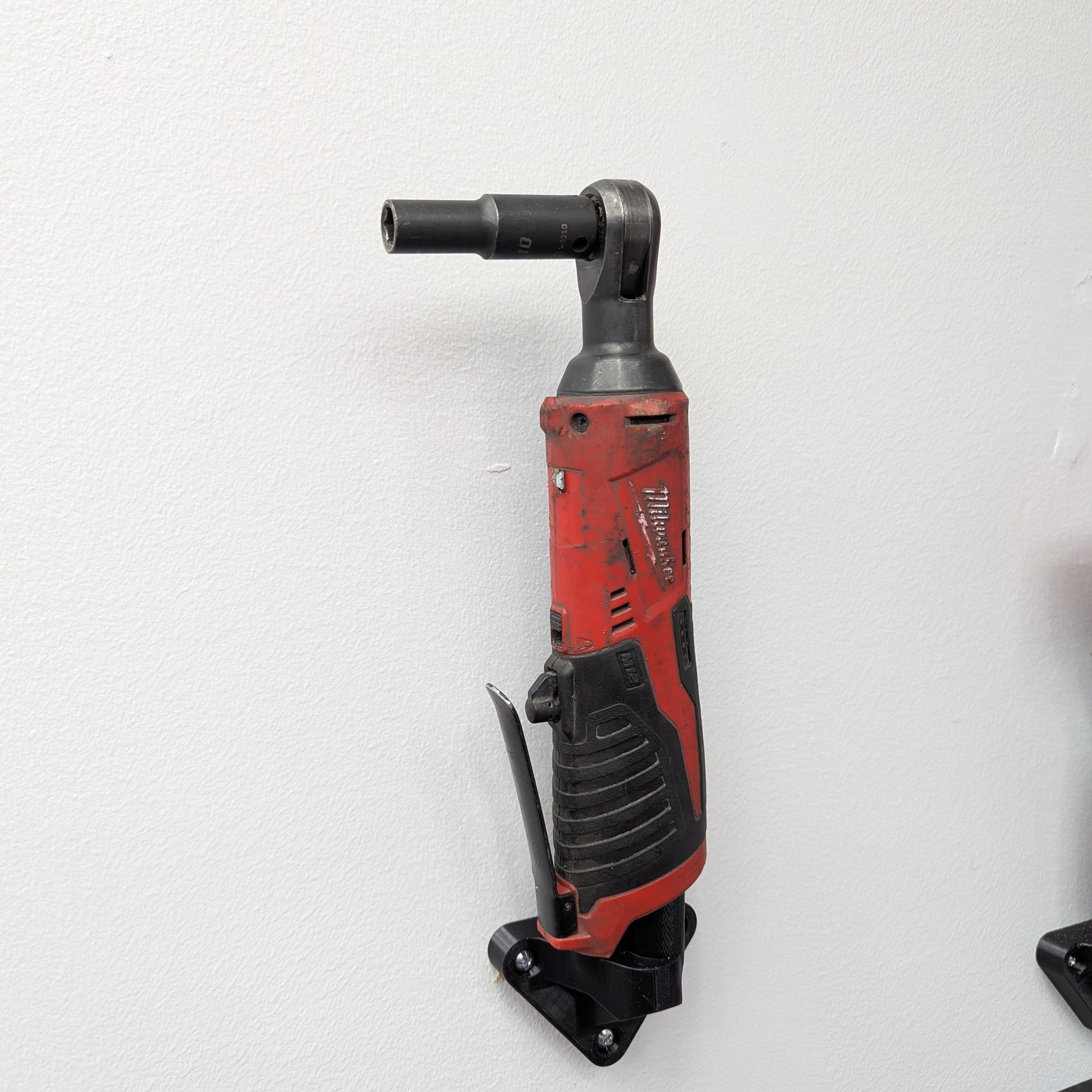 Milwaukee M12 tool mount left facing wall installation for organized tool storage