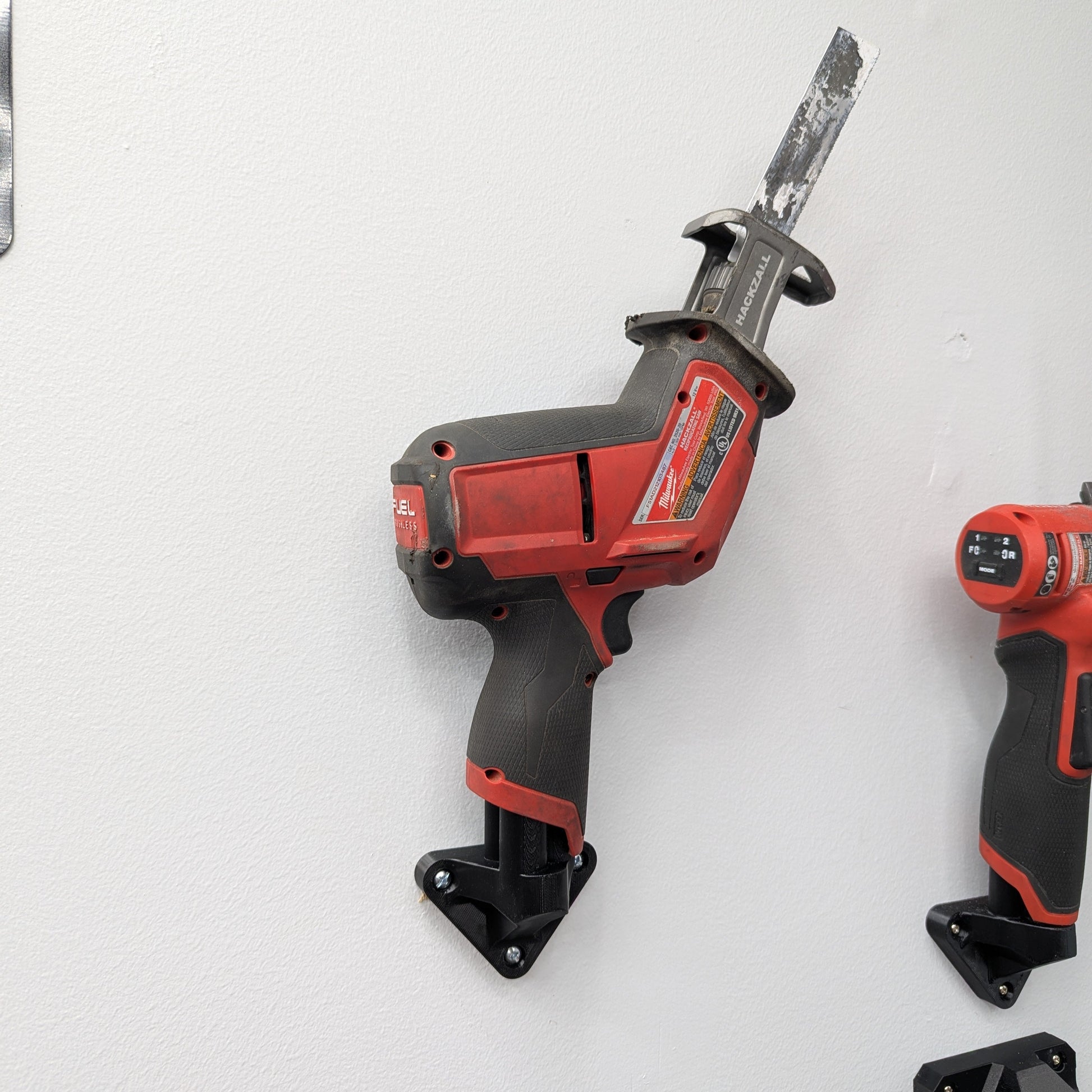 Milwaukee M12 tool mount wall organizer for cordless tools with angled clearance design